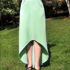 Straight Skirt with Asymmetrical Hem. Light Green